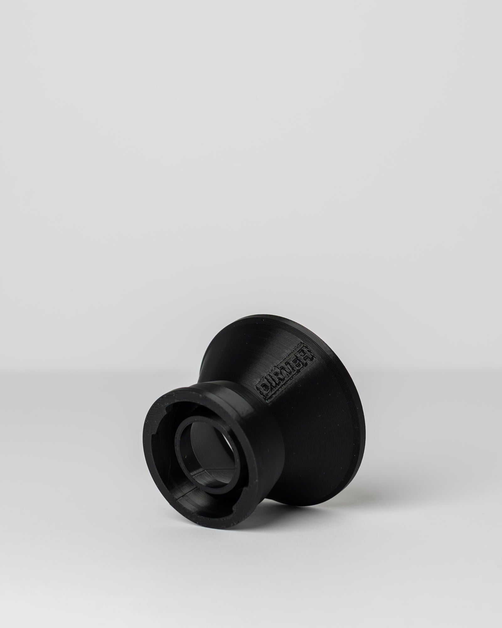 DIRT-EH 2-stroke oil funnel on a light gray background