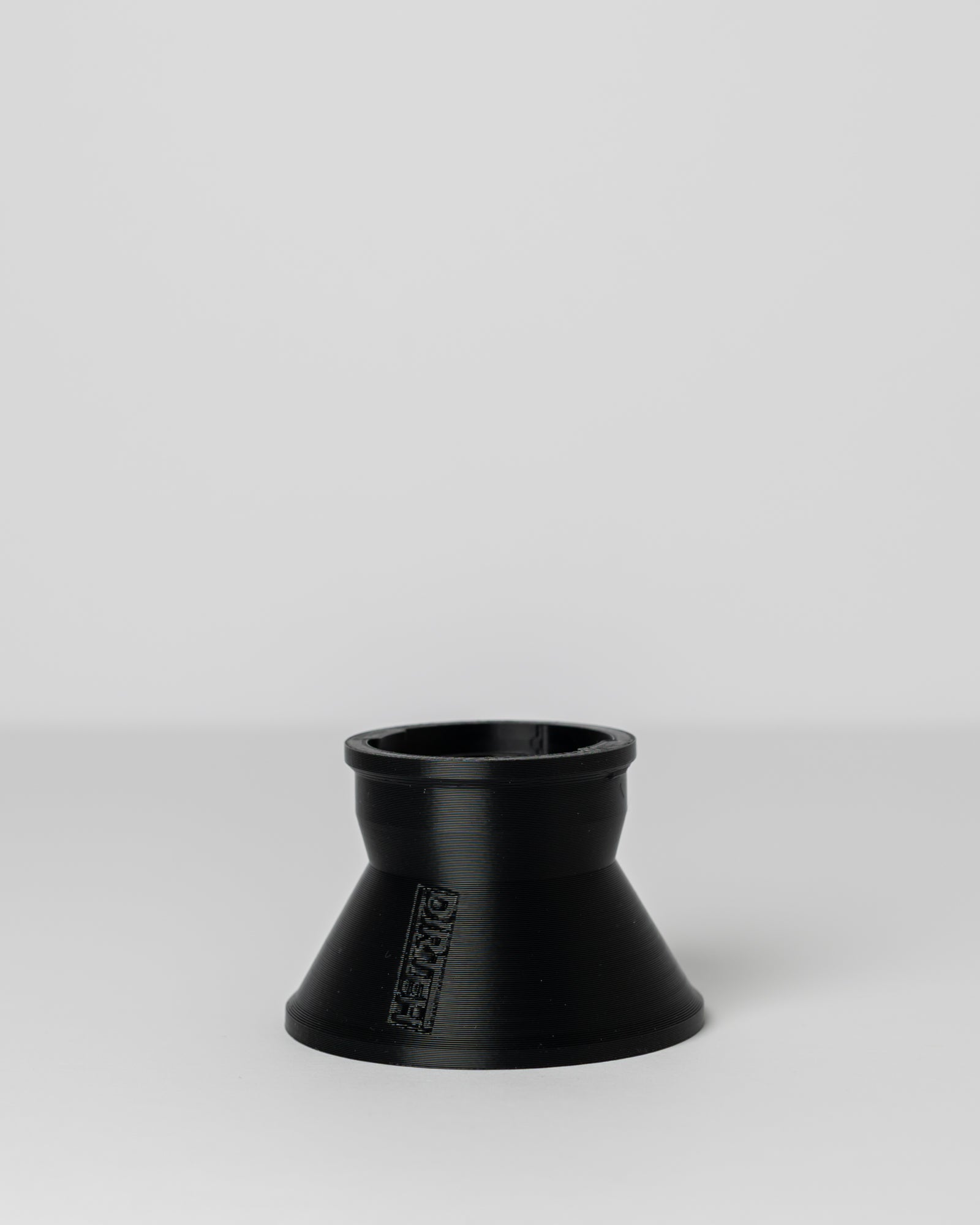 DIRT-EH 2-stroke oil funnel on a light gray background