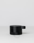 DIRT-EH radiator cap removal tool on a light gray background