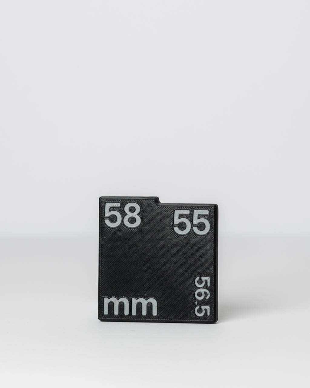 DIRT-EH chain slack gauge on a light gray background